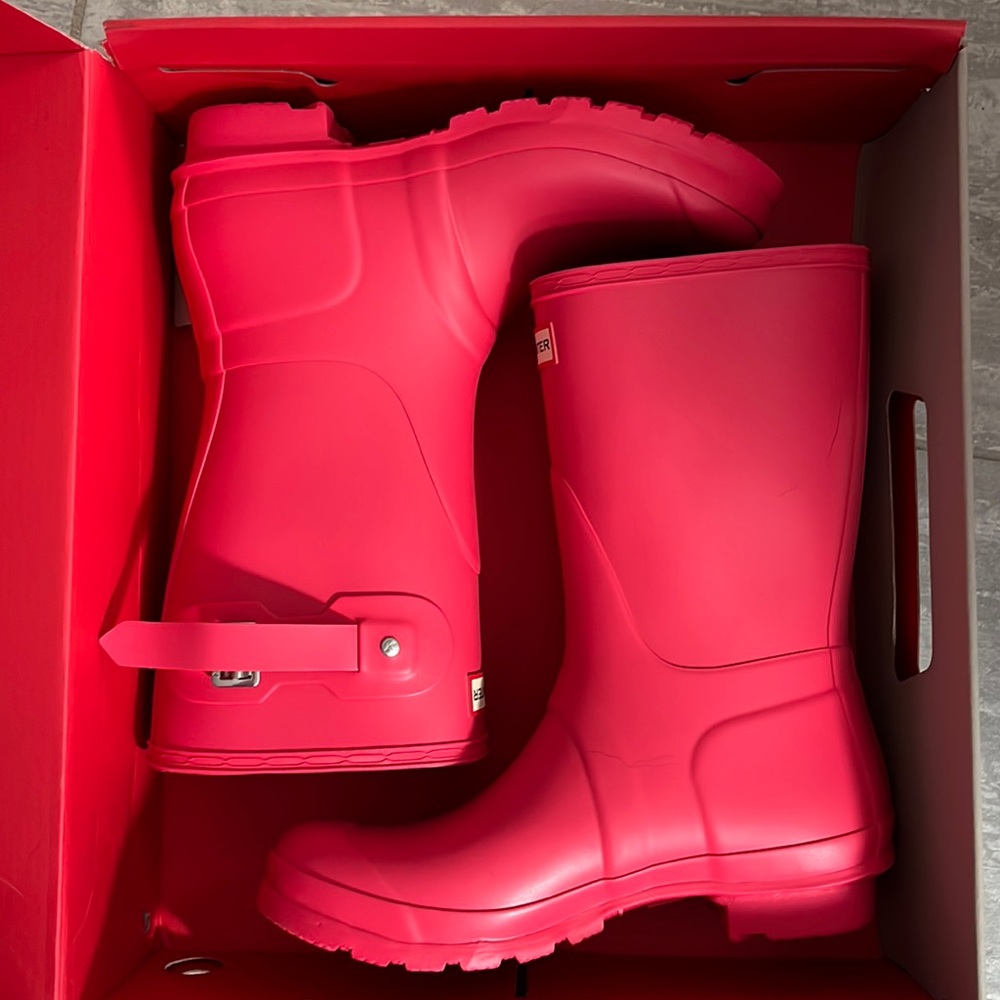 Womens pink Hunter boots.